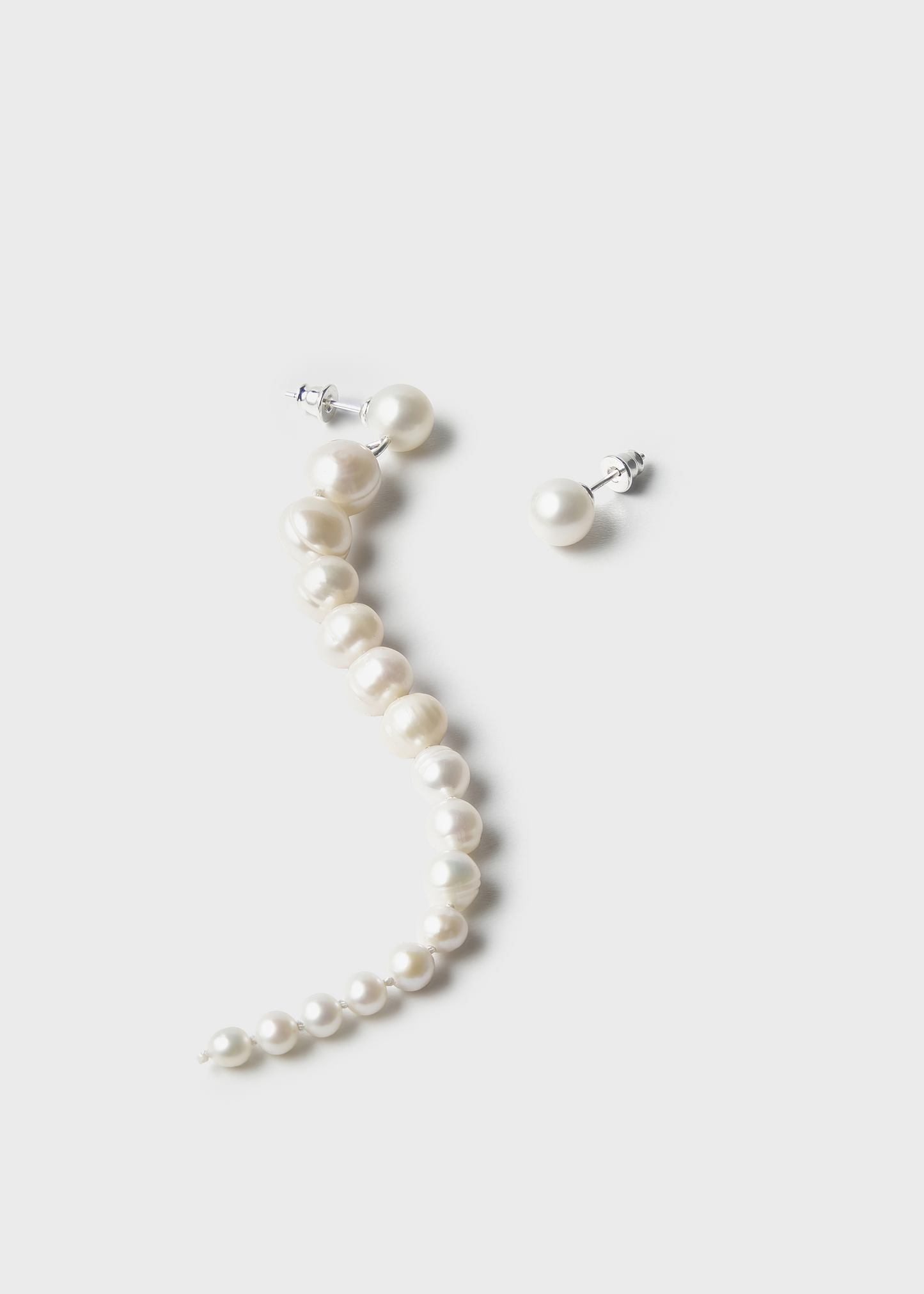 Kolczyki asymetryczne wiszące perły